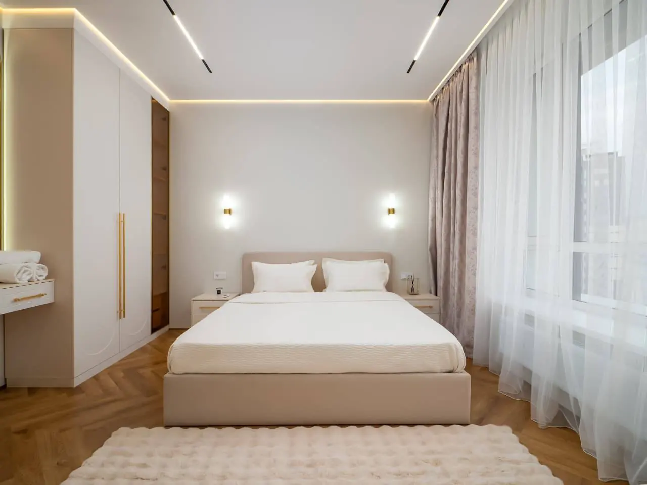 Warm beige bedroom with chevron floor